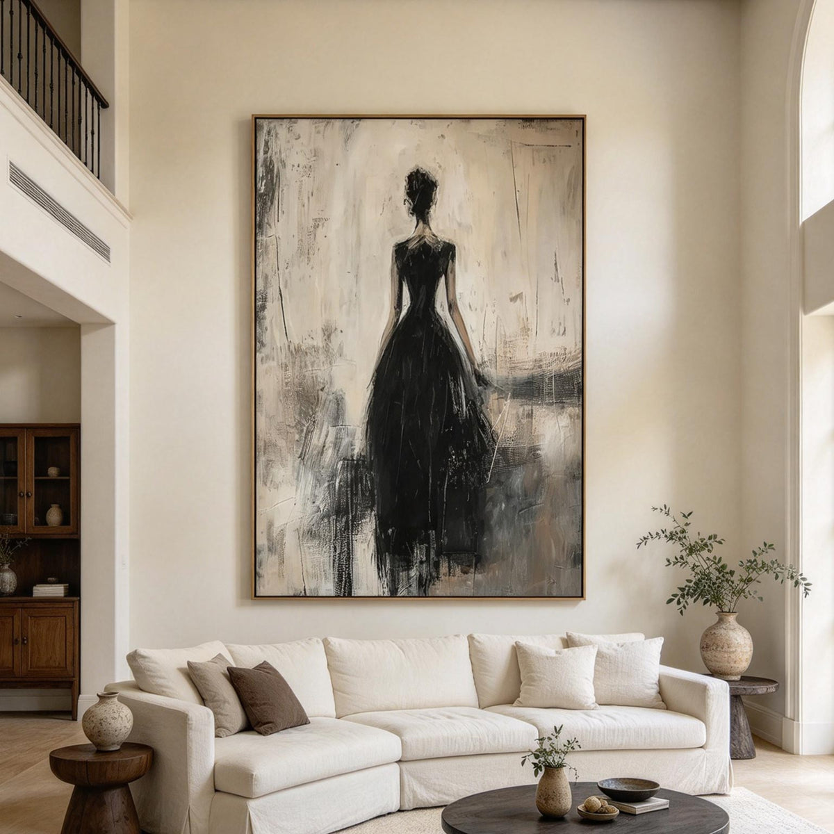 Oversized lady in black gown painting in a high-ceiling living room